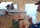 Polri-Lakukan-Airdrop-Bantuan-untuk-Warga-Kampung-Landor-yang-Masih-Terisolasi